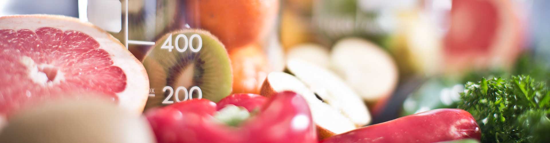 fruit and vegetables in a beaker in a laboratory