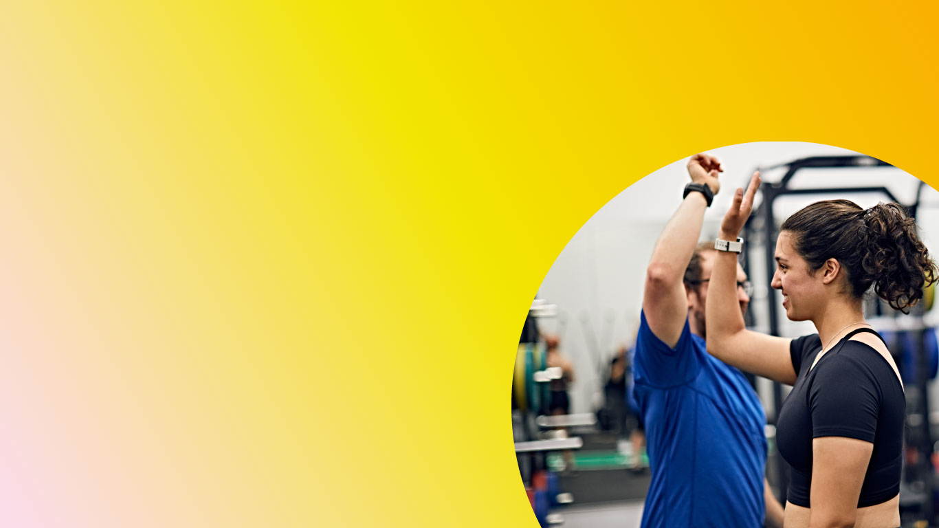 Student lifting weight in the gym